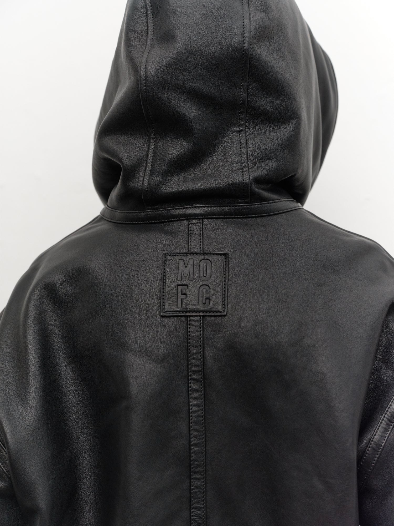 Reversible Hooded Leather and Faux Fur Jacket